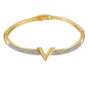 Campaign gold bracelet